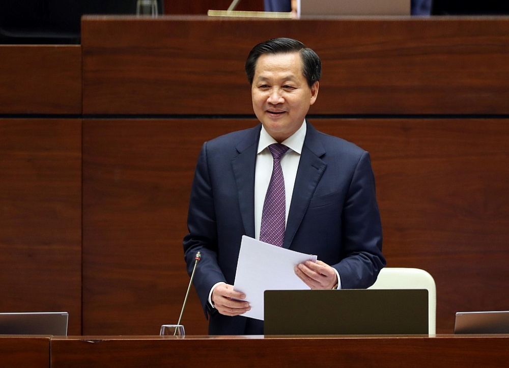 Phó Thủ tướng Chính phủ Lê Minh Khái trả lời chất vấn tại Quốc hội. Ảnh: VGP