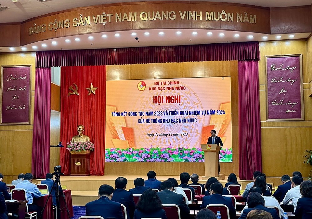 Tổng giám đốc KBNN Trần Quân phát biểu tại Hội nghị tổng kết công tác năm 2023 và triển khai nhiệm vụ năm 2024 của hệ thống KBNN, ngày 11/12. 	Ảnh: H.D
