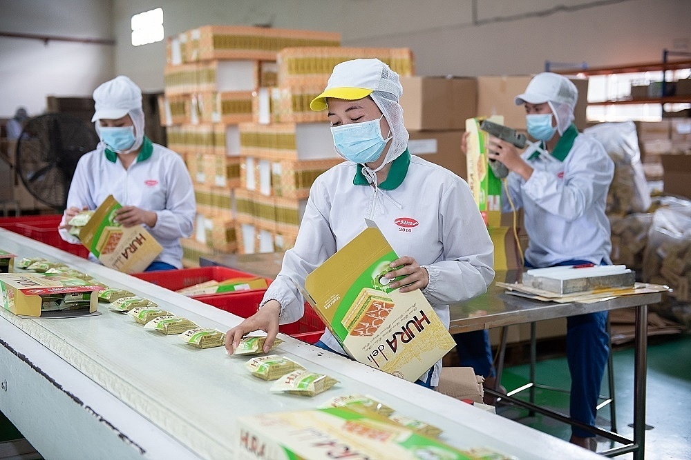 Dây chuyền sản xuất bánh kẹo của Công ty Bibica - Thành viên PAN Group - doanh nghiệp tiên phong thực hành ESG và đã đạt nhiều kết quả tích cực. 	Ảnh: TL