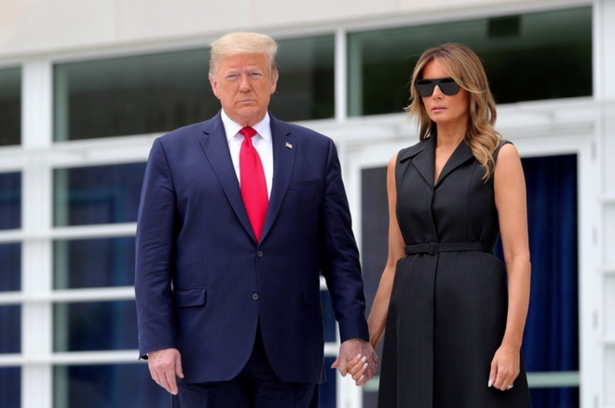 Tổng thống Trump và phu nhân Melania Trump đều mắc Covid-19. Ảnh: Reuters