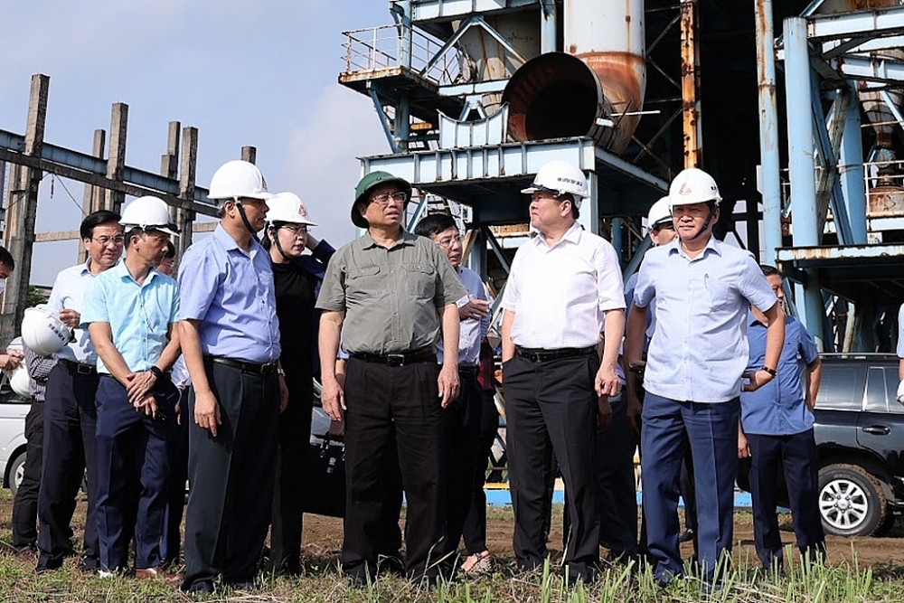 Thủ tướng Phạm Minh Chính khảo sát thực tế Dự án mở rộng giai đoạn 2 Nhà máy Gang thép Thái Nguyên vào tháng 7/2022. 	 Ảnh: VGP