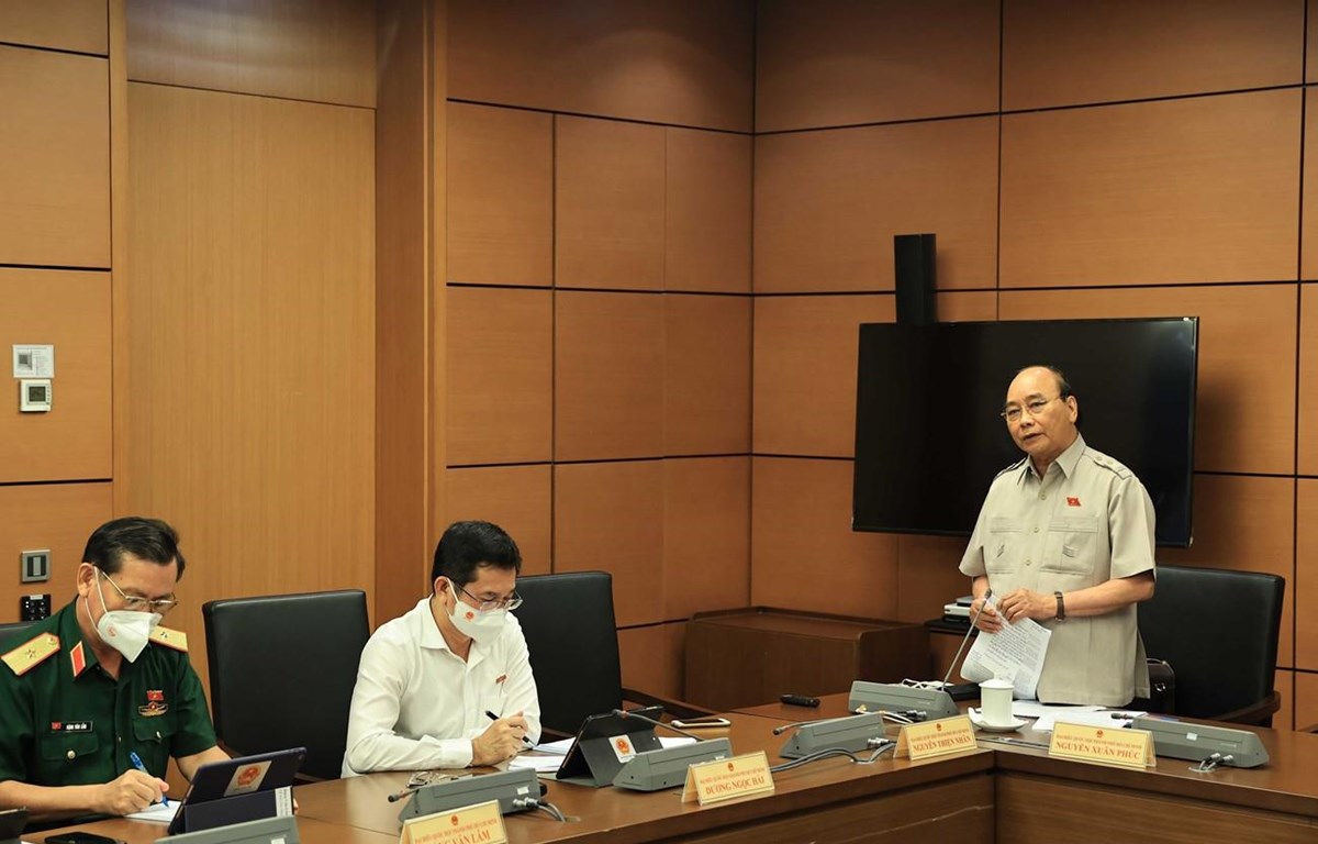 Chủ tịch nước Nguyễn Xuân Phúc phát biểu trong phiên thảo luận tại tổ. (Ảnh: Thống Nhất-TTXVN)