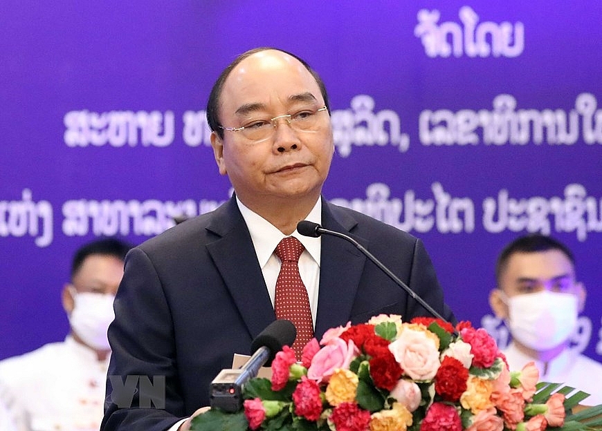 [Photo] Những hoạt động của Chủ tịch nước Nguyễn Xuân Phúc tại Lào | Chính trị | Vietnam+ (VietnamPlus)